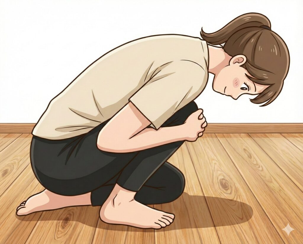 片膝を抱えて体重をかけ、足首の可動域を広げるストレッチのイラスト